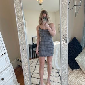 Black and white body con mini dress from Windsor. Red detailing.